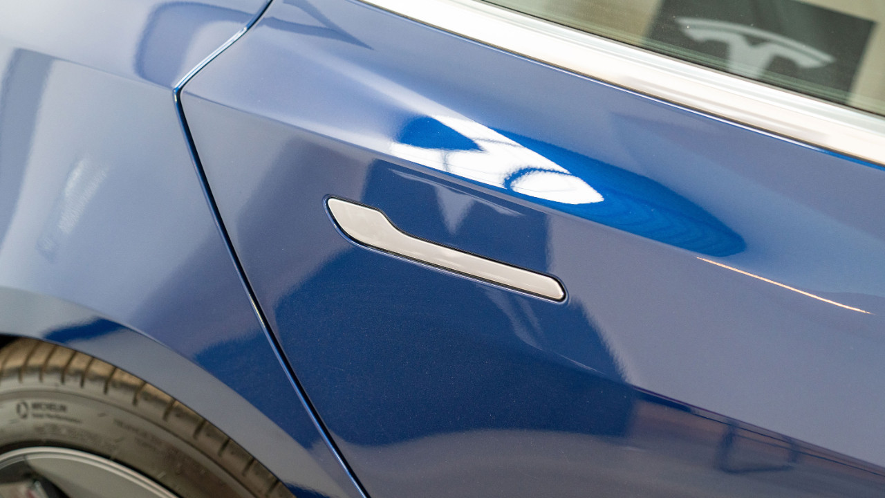 teslaya yeni sorusturma bu kez hedefte kapi kollari var WsipvNPE